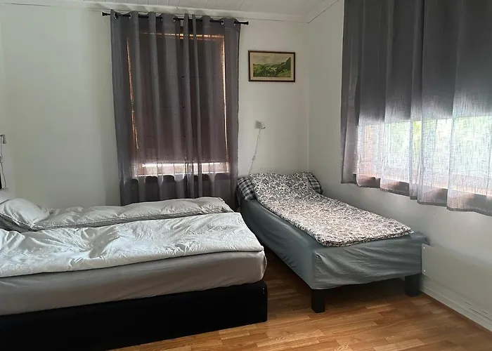 Habitación en casa particular Family With Parking Possibility